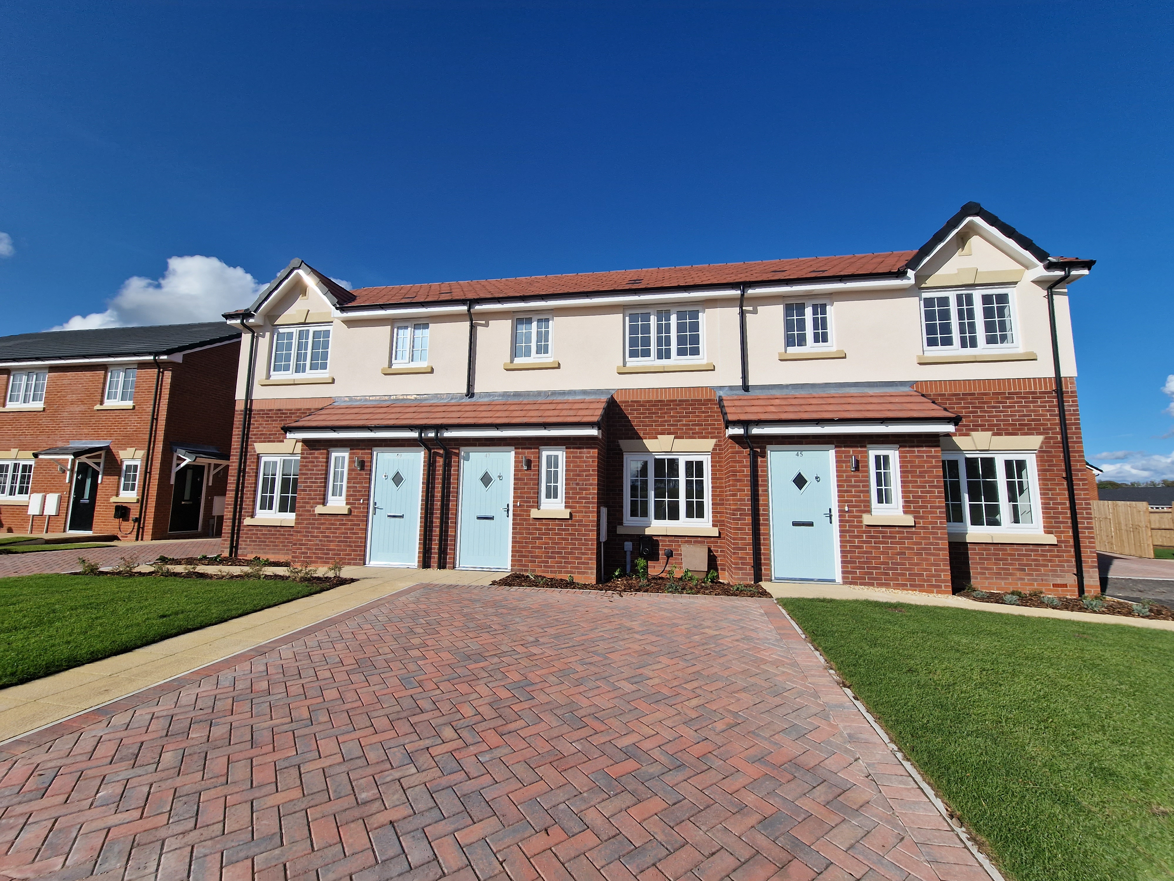 An image of new homes in a rural setting