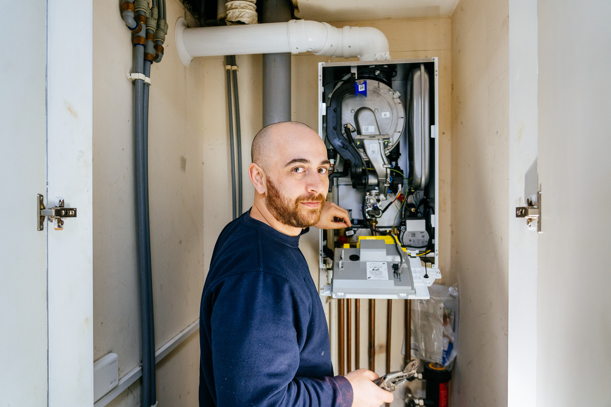 Gas engineer servicing a boiler