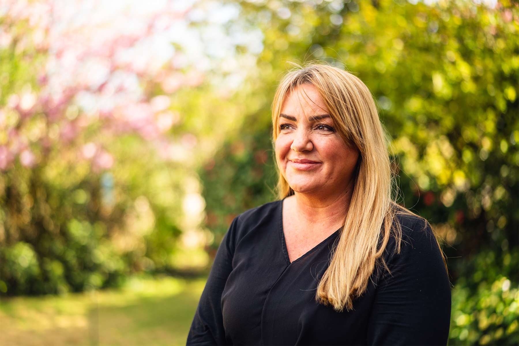 Jen Mcguiness in front of trees