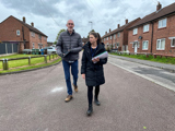 Image of 2 people on estate walkabout, lower-lane