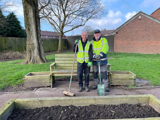 Image of 2 men gardening