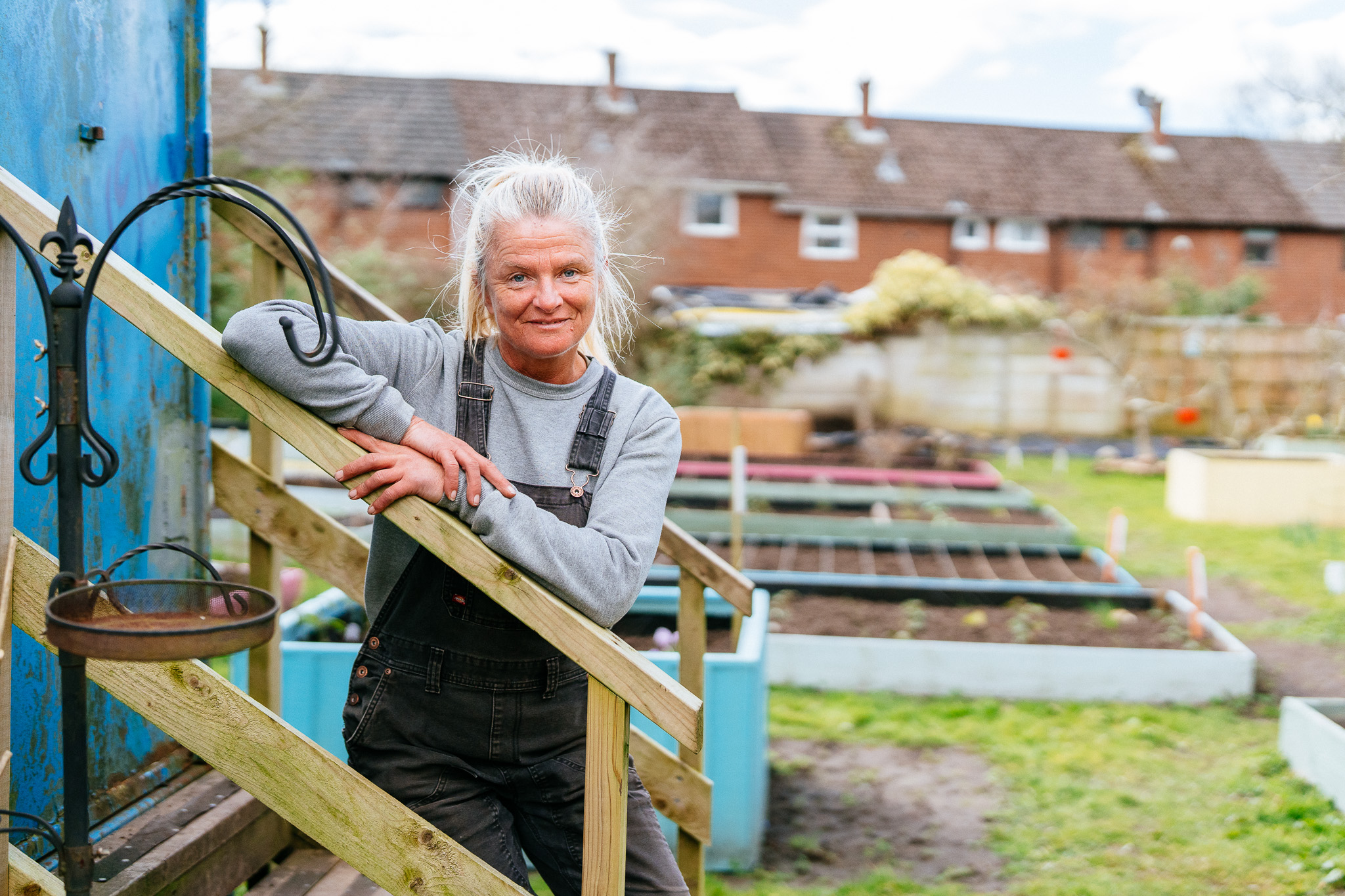 Tina enjoying time in the community allotment, promoting health and wellbeing.